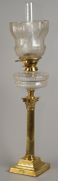 A late 19th century brass Corinthian Columnar oil lamp with clear glass reservoir and etched glass shade, 23 ins. high at Whyte's Auctions