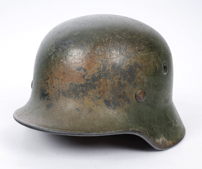 1939-1945 German M42 field-camoflaged helmet. at Whyte's Auctions