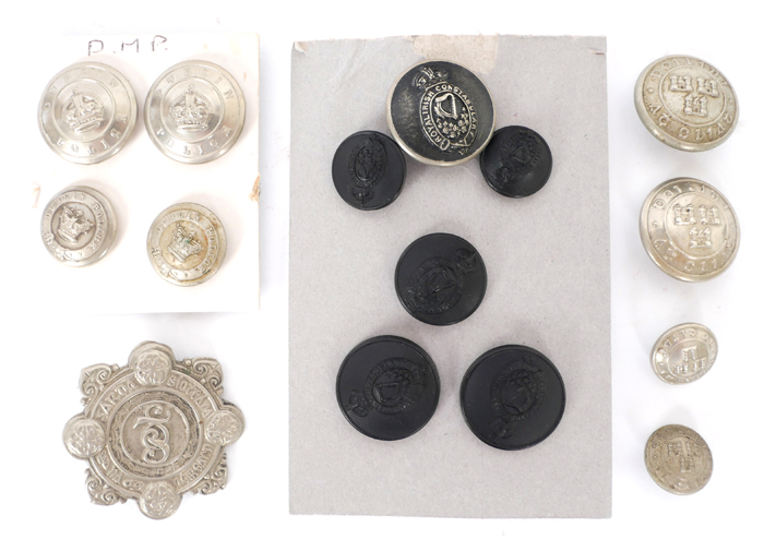 Irish police collection, uniform buttons and badges at Whyte's Auctions
