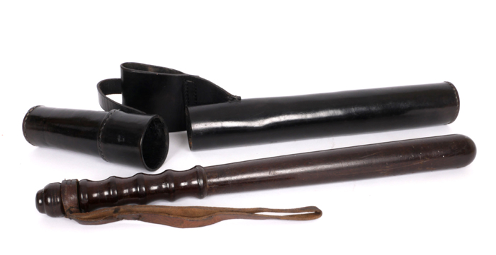 Police truncheon and black uniform scabbard. at Whyte's Auctions