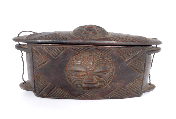 Early 20th century, Angola, Mbunda carved wood medicine chest and lid. at Whyte's Auctions
