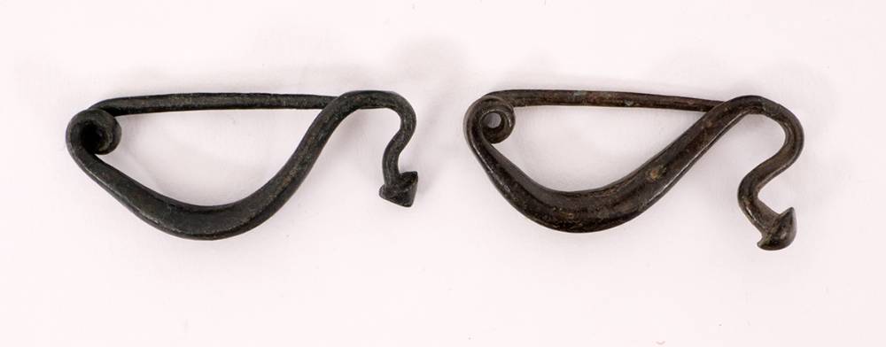 Circa 300BC. Pair of Iron Age Celtic la tene type bow brooches, 28-30mm in length. at Whyte's Auctions