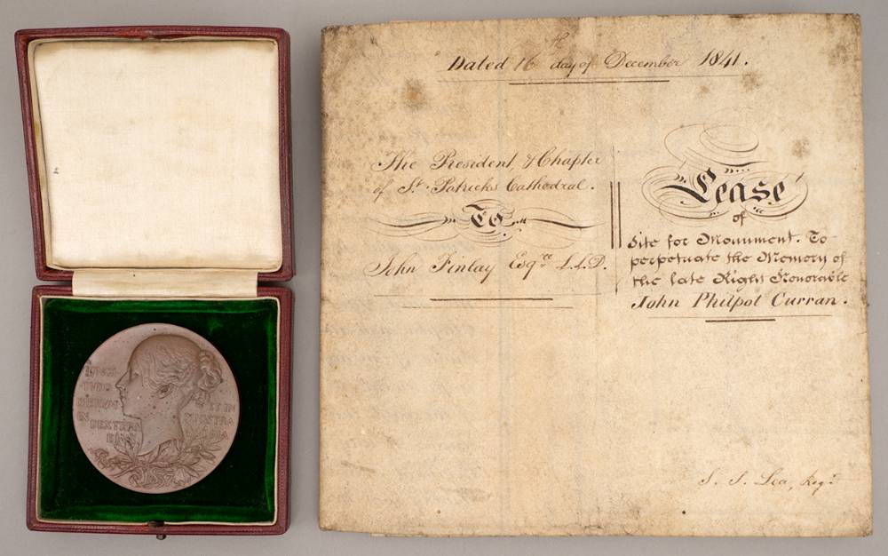 1841 Indenture concerning the erection of a monument to John Philpot Curran and an 1897 Queen Victoria Diamond Jubilee medal. at Whyte's Auctions