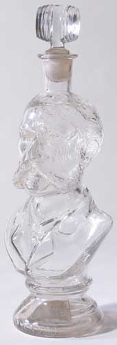 Commemorative moulded glass decanter in the shape of a bust. at Whyte's Auctions