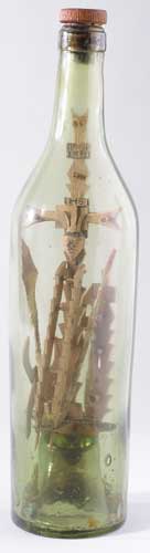 Republican prisoner craft: a wooden crucifix in a bottle. at Whyte's Auctions