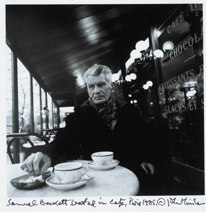 SAMUEL BECKETT SEATED IN CAFE, PARIS, 1985 by John Minihan (b.1946) (b.1946) at Whyte's Auctions