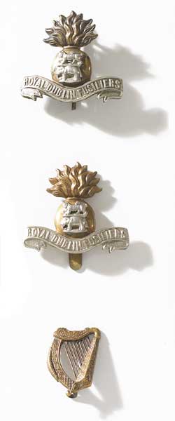 1914 Royal Dublin Fusiliers Cap Badges and an Irish Harp Badge at Whyte's Auctions