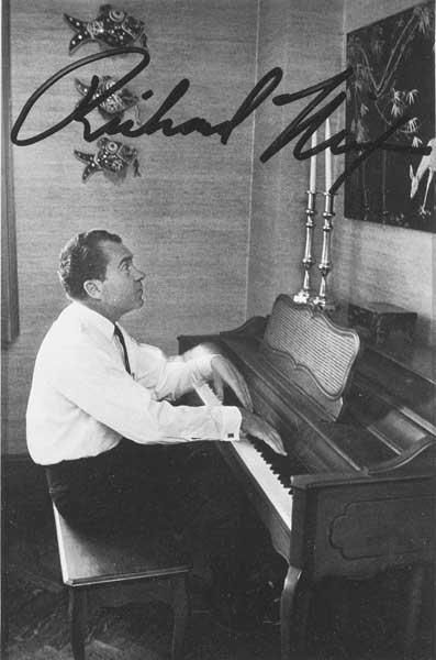 Circa 1970 Richard Nixon autographed photograph playing piano at Whyte's Auctions