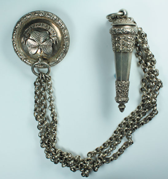 circa 1922: Royal Irish/Ulster Rifles officer's pouch belt badge, whistle and chain at Whyte's Auctions