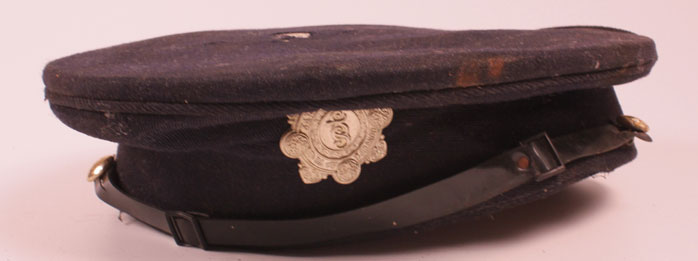 20th Century: Garda Sochna jacket cap and belt at Whyte's Auctions