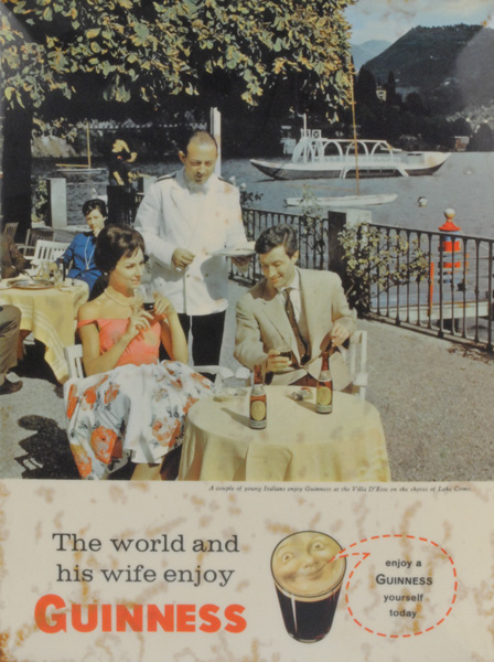 circa 1960: Guinness 'Lake Como' standing advertisement at Whyte's Auctions