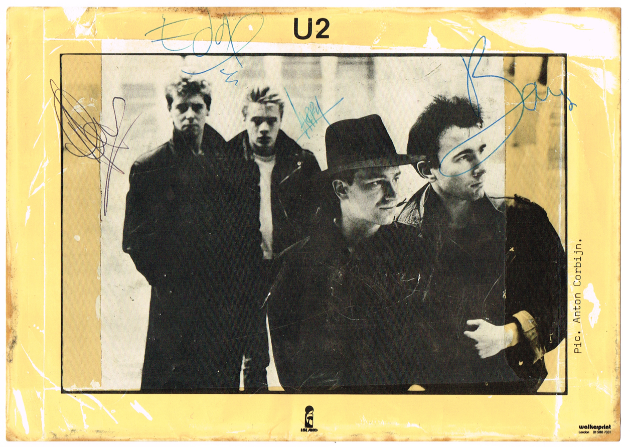 U2: Island Records promotional card autographed by all four band members at Whyte's Auctions