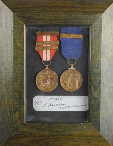 1939-46: Emergency Service Medal and 10 Year Service Medal pair to J. Brennan at Whyte's Auctions