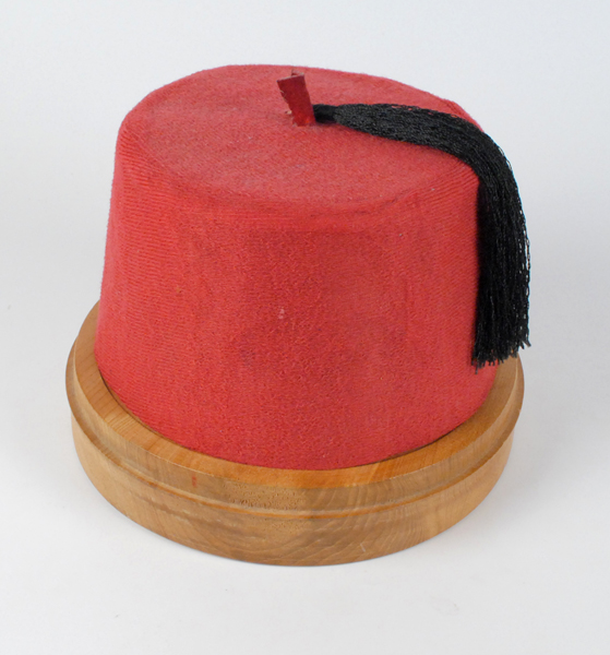 circa 1975: Tommy Cooper signed fez at Whyte's Auctions