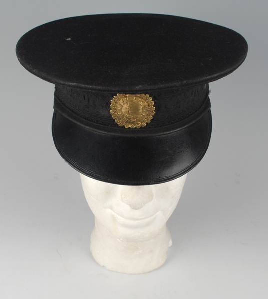 19th Century: Commissioner of Irish Lights peaked cap with badge at Whyte's Auctions