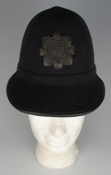 circa 1950: Garda Siochana blue cloth night helmet at Whyte's Auctions