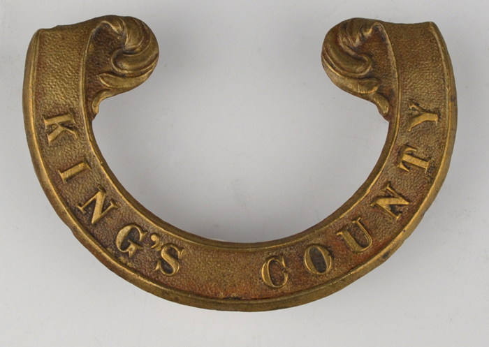 19th Century: King's County Militia Scroll Forage Cap Badge at Whyte's Auctions