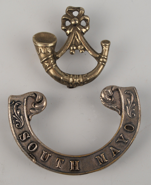 19th Century: South Mayo Militia Scroll forage cap badge at Whyte's Auctions