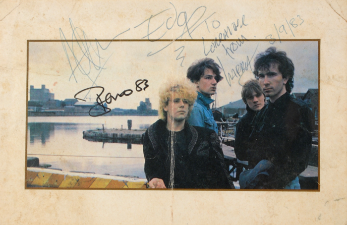 U2: 1983 promotional card autographed by all four band members <R> at Whyte's Auctions