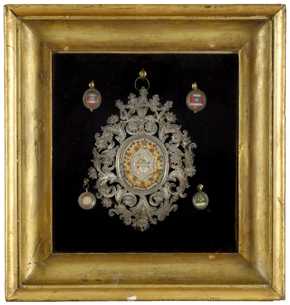 A framed reliquary containing the relics of 22 Saints. at Whyte's Auctions