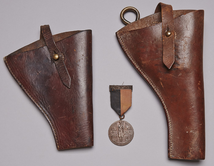 1918 - 1921 War of Independence Service Medal and two brown leather pistol holsters. at Whyte's Auctions
