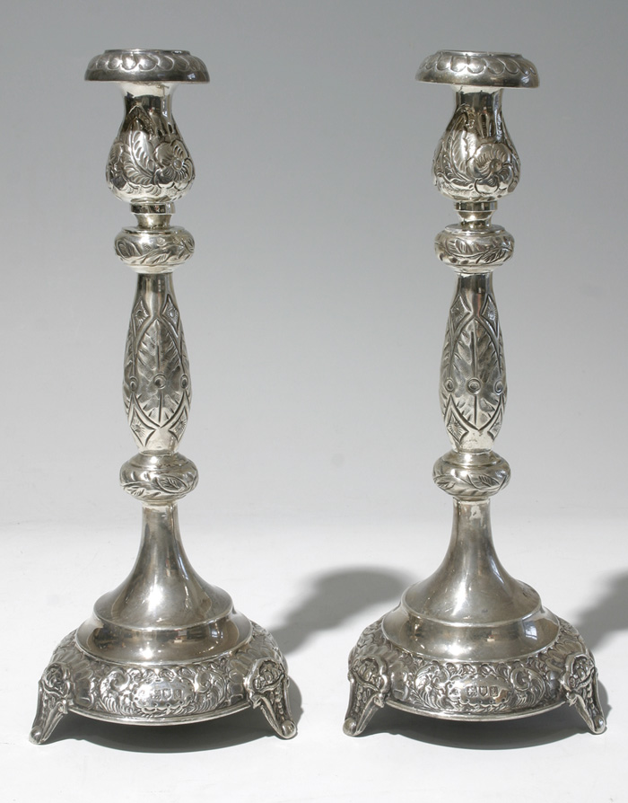 A pair of early 20th century silver candlesticks at Whyte's Auctions
