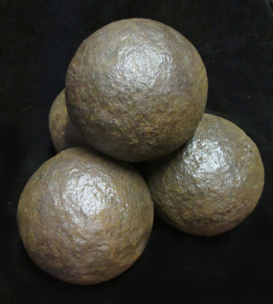 18th/19th century 32lb naval cannonballs at Whyte's Auctions