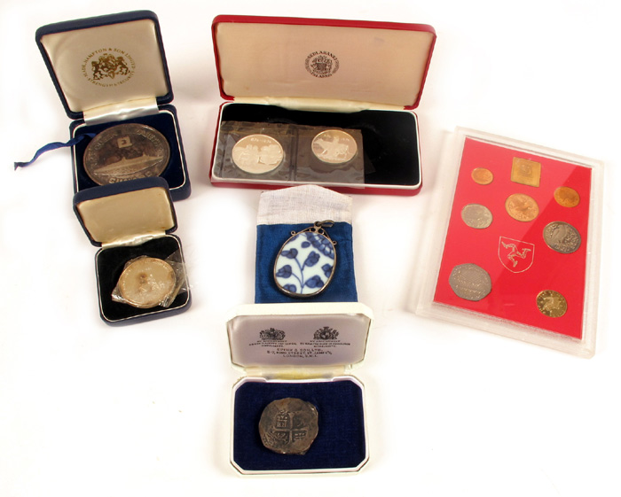 Mixed lot of coins and medals including pirate hoard" piece of eight ." at Whyte's Auctions