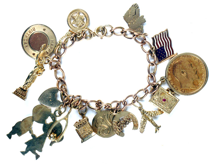 Gold charm bracelet incorporating Edward VII Gold sovereign, 1910, set ...