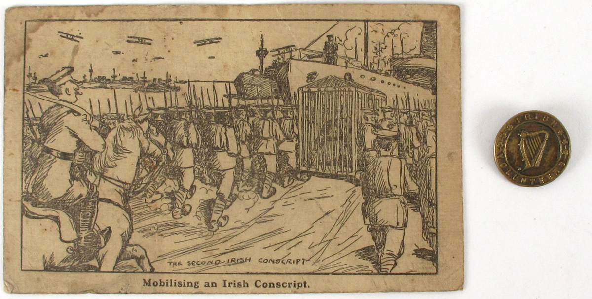 1914-1916 Irish Volunteers badge, 1916 Sinn Fein Rebellion Handbook and 1918 Anti-Conscription picture postcard. (7) at Whyte's Auctions