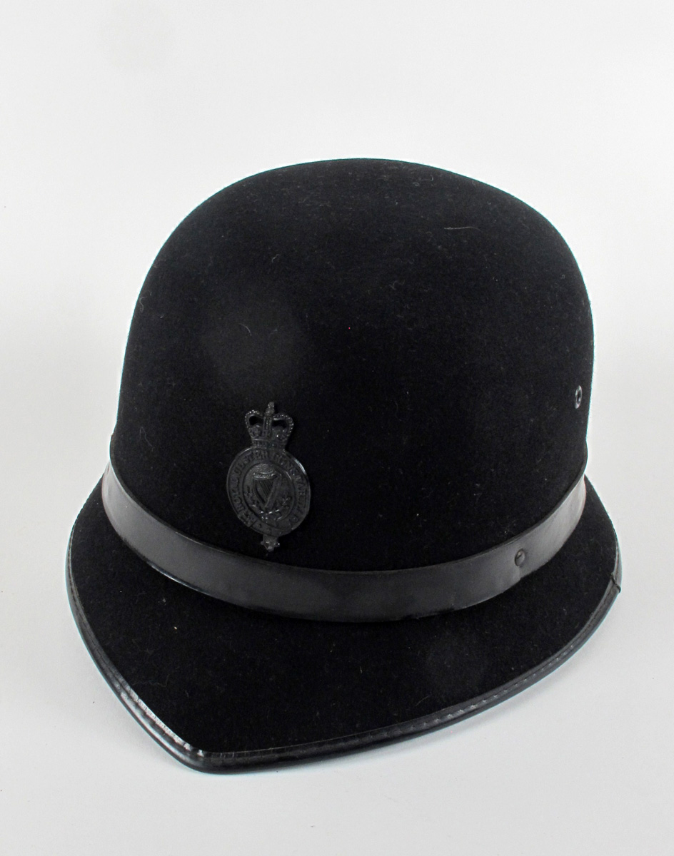 A Royal Ulster Constabulary night helmet, the Belfast bowler"." at Whyte's Auctions