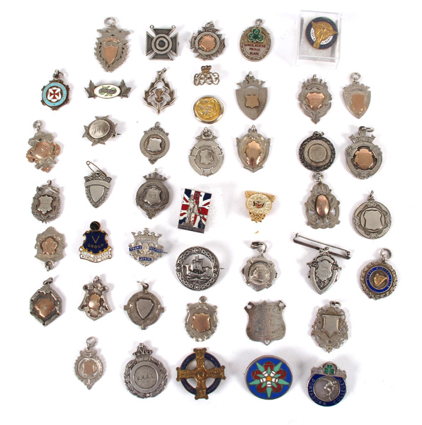 Sports, a collection of silver and other medals and badges. at Whyte's Auctions