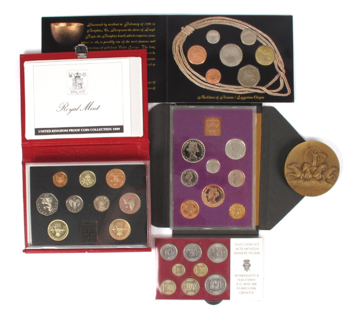 Mainly English collection in an album including gold and silver coins. at Whyte's Auctions