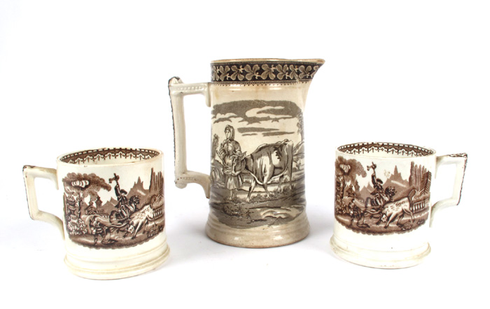 1870s Pair of Irish transfer printed pottery mugs and a jug. at Whyte's Auctions