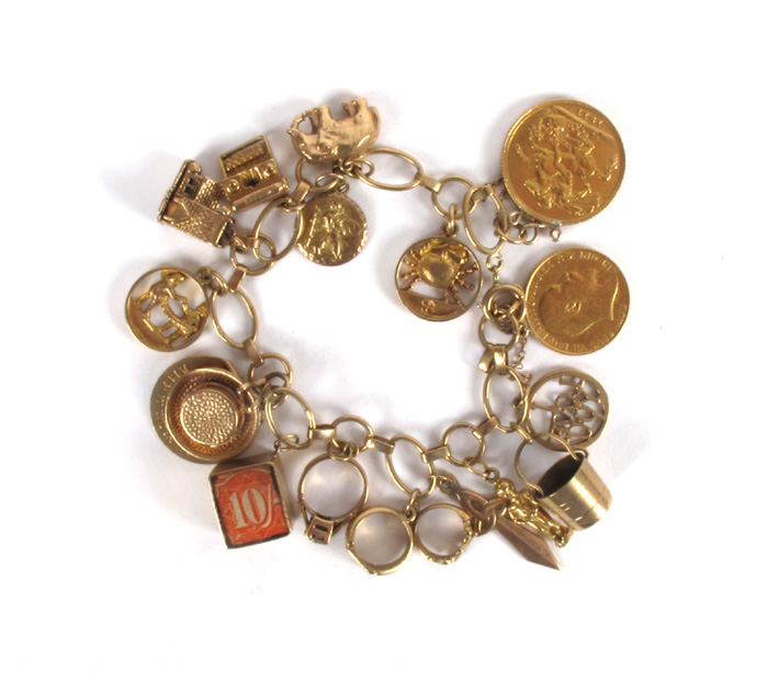A gold charm bracelet at Whyte's Auctions