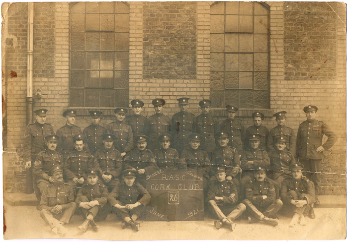 1921 (June). Photograph of a group of soldiers with sign "R.A.S.C. Cork Club". at Whyte's Auctions