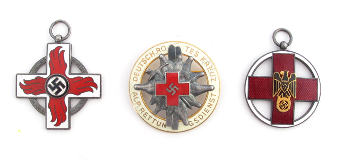 1939-45 German Third Reich, Red Cross badges and a Fire Brigade award. at Whyte's Auctions