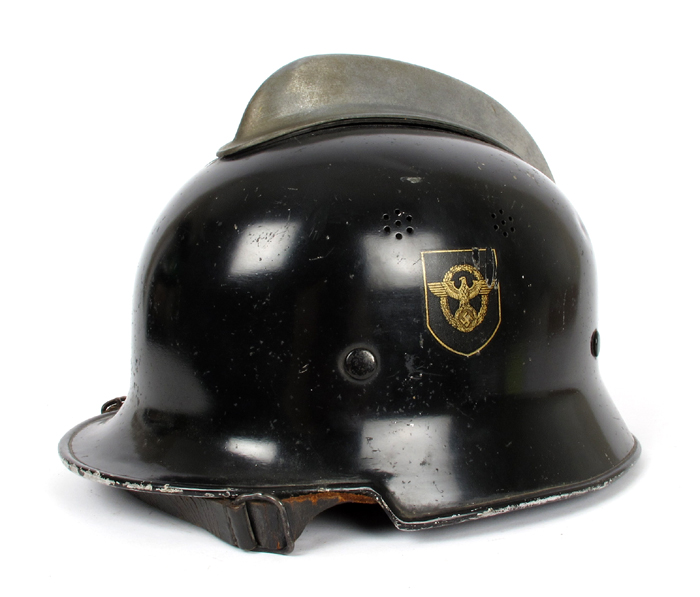 1933-1945 German Third Reich, Fire Police (Feuerschutzpolizei) double decal helmet and axe. at Whyte's Auctions
