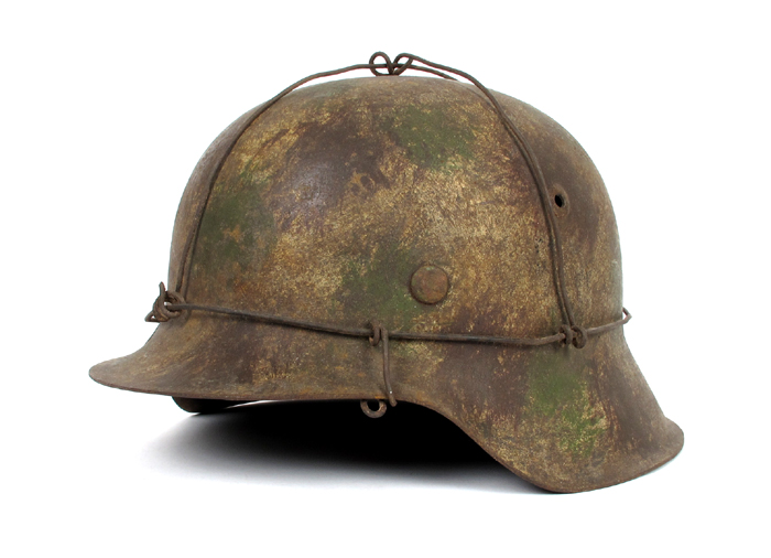 1939-1945 German Third Reich, M40 Army camouflage helmet. at Whyte's Auctions