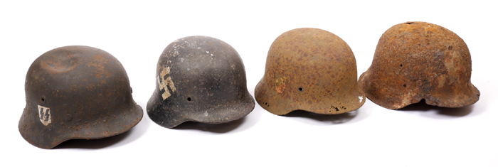 1939-1945 German Third Reich, battlefield recovered helmets at Whyte's Auctions