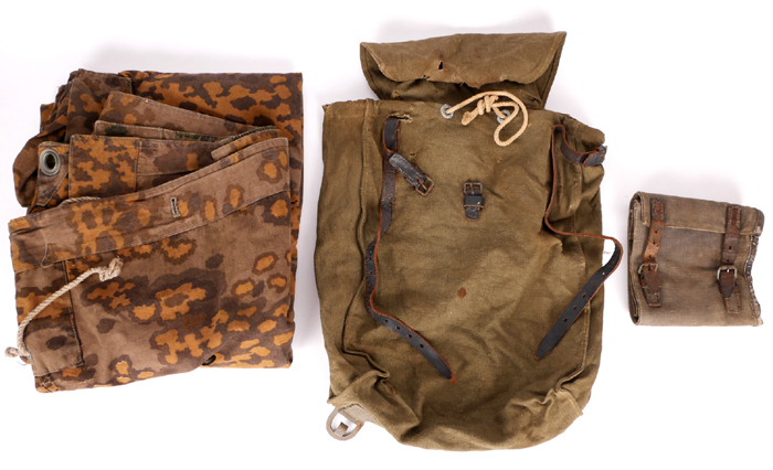 1939-1945 German Third Reich, Waffen SS canvas rucksack, garters and summer / autumn zeltban. at Whyte's Auctions
