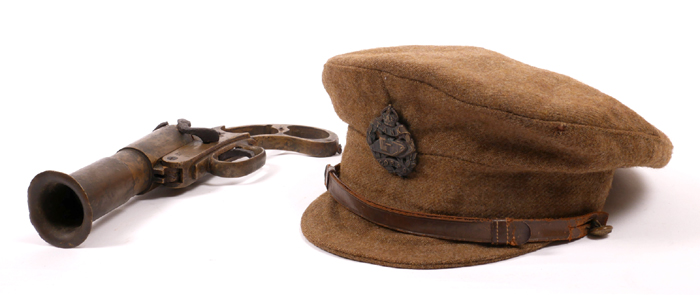 1914-1918 World War I, British Tank Corps uniform cap and a flare pistol. at Whyte's Auctions