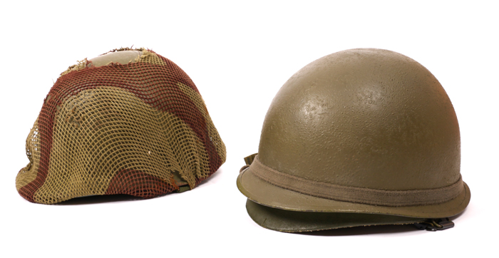 1965-1975 Vietnam War, two United States M1 helmets. at Whyte's Auctions