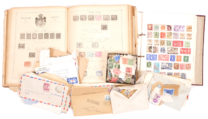 Stamps. All world collection in two old albums and loose. at Whyte's Auctions