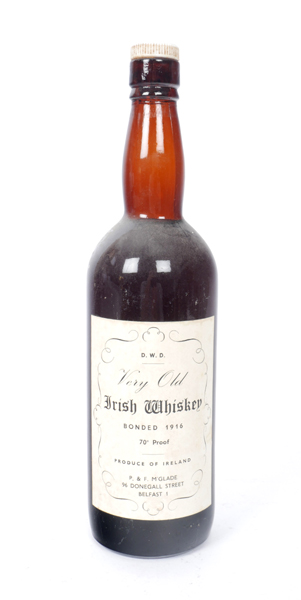 1916 A bottle of 100 year old whiskey by Dublin Whiskey Distillery. at Whyte's Auctions