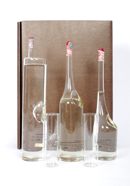 Alexander Society Grappa, three bottles. at Whyte's Auctions