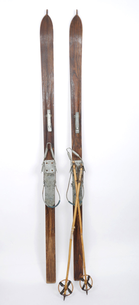 Mid-20th century wooden skis and poles. at Whyte's Auctions