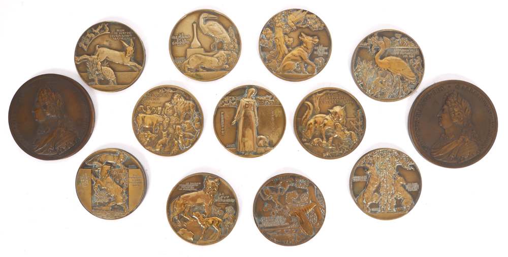 Bronze medallions, set of eleven after Jean Vernon and two depicting the bust of Louis XIV and Versailles. at Whyte's Auctions