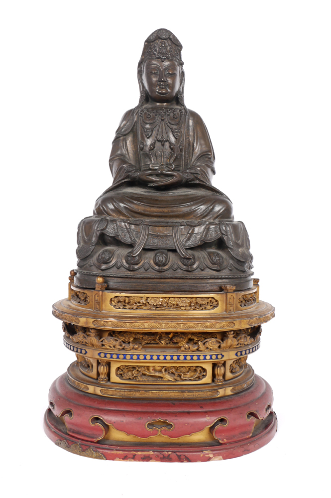 Bronze figure of Guanyin. at Whyte's Auctions
