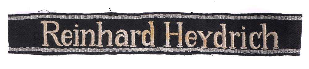 1942-1945  "Reinhard Heydrich" 11th SS-Gebirgsjger Regiment other ranks cuff title. at Whyte's Auctions